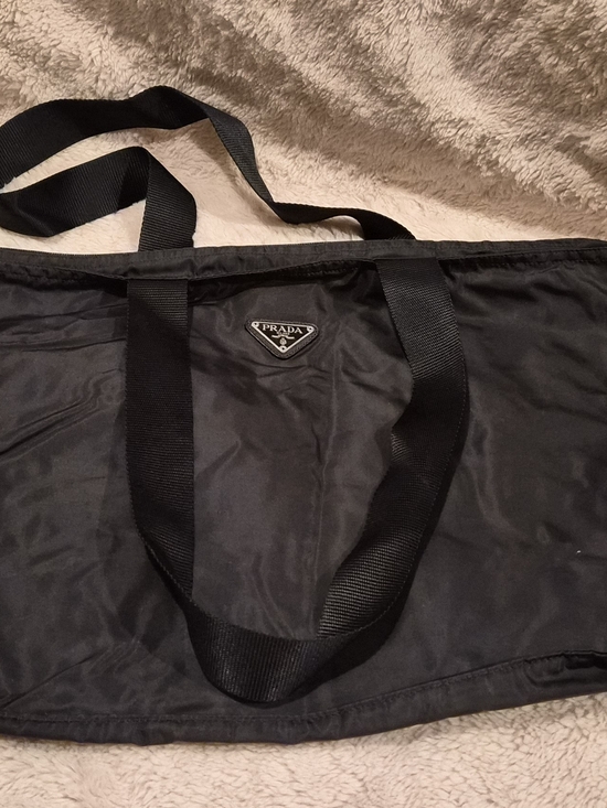Prada Handbags - Prada Black Nylon Duffel 14x20 with Logo Plaque Like New!